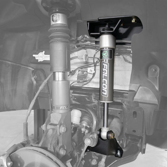 Close-up of the Stage 1 System - Sprinter AWD, 4x4 (2019-Present 2500) by Van Compass, highlighting the Falcon 2.1 Monotube shocks and bump stop upgrades.