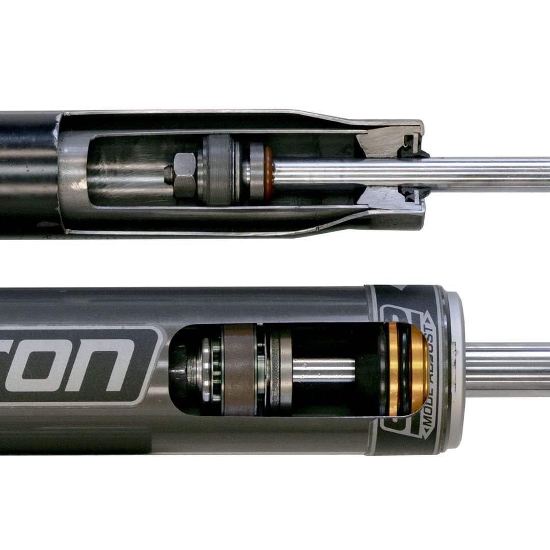 STAGE 1 SYSTEM - SPRINTER AWD, 4X4 (2019-PRESENT 3500) by VAN COMPASS, featuring close-up of Falcon 2.1 Monotube shock and metal components for improved handling and stability.