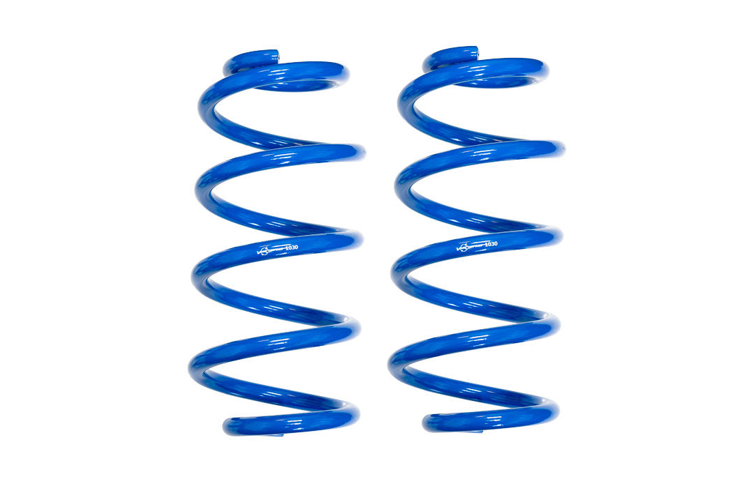 A set of blue coil springs included in the COMPLETE 4 LIFT KIT - TRANSIT (2015-PRESENT RWD SINGLE WHEEL ONLY) by VAN COMPASS.