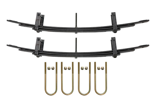 Rear Mini Spring Pack for Sprinter 4x4 (2015+ 2500) by VAN COMPASS, featuring a black curved metal structure with gold parts, enhancing ride quality and stability.