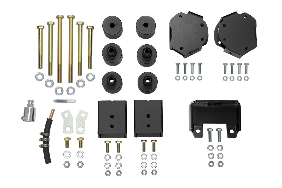 STAGE 6.3 SYSTEM, 2 LIFT - SPRINTER 4X4 (2019-2022 2500 ONLY) by VAN COMPASS; a set of black metal parts including adjustable shocks, bolts, and a lift kit.