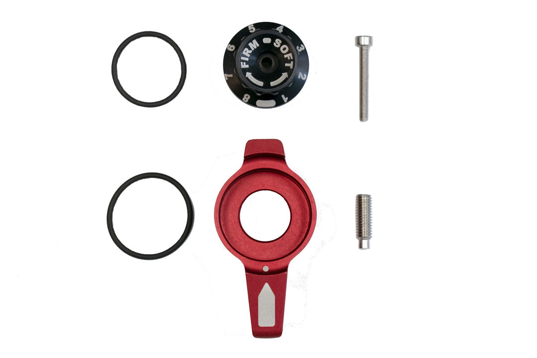 Falcon 3.3 Replacement Knob Kit featuring a circular knob with a white arrow and dial, designed for easy adjustment and refreshing shock appearance.
