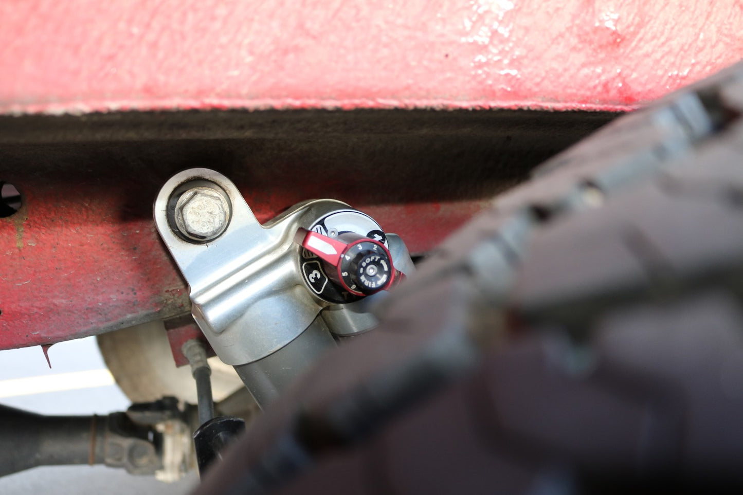 FALCON 3.3 SP2 Fast Adjust Rear Shocks - Sprinter 2WD (1994+ 2500) Pair, featuring a close-up of the red and black adjustment knob and mechanical components.