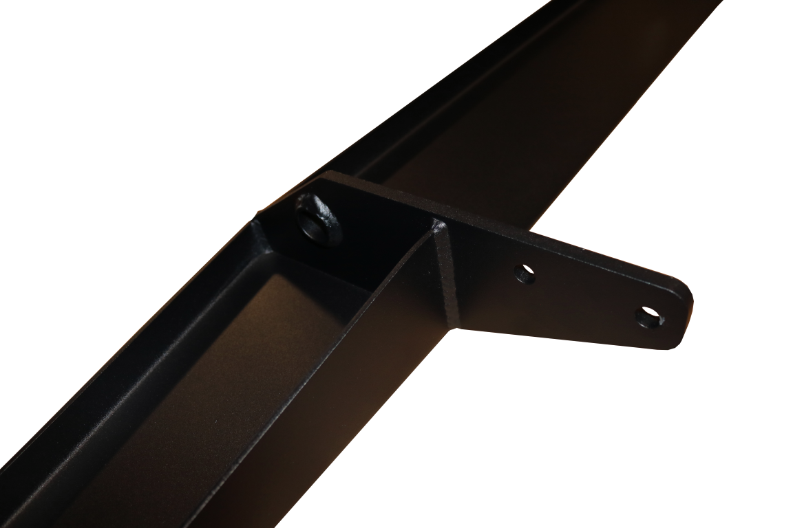 REAR TUG STEP - SPRINTER (2019+) by VAN COMPASS, a black metal step with holes, designed for easy cargo loading and rear protection, attaches to the factory rear hitch.