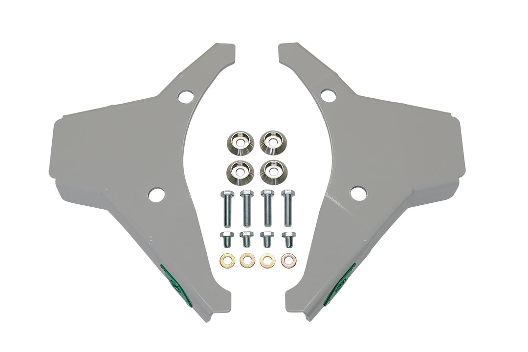 Close-up of Front Lower Control Arm Skidplates - Sprinter (2007+) by Van Compass, showing metal parts, bolts, and precision-machined counterbored washers for protection and aerodynamics.