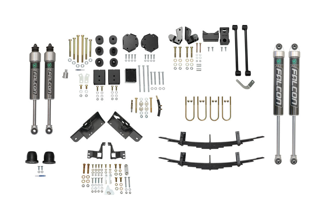 Stage 5 System, 2 Lift - Sprinter AWD (2023+ 2500 Only) by Van Compass, showcasing various vehicle parts including shocks, metal brackets, and springs for improved ground clearance and handling.