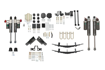 STAGE 6.3 SYSTEM, 2 LIFT - SPRINTER AWD (2023+ 2500 ONLY) by VAN COMPASS showing vehicle parts, including Falcon adjustable shocks, metal brackets, bolts, and nuts.