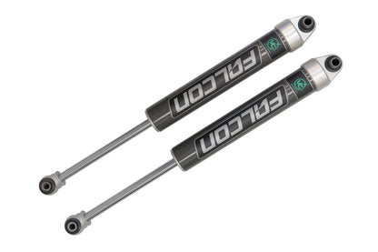 Pair of Falcon 2.1 Monotube Rear Shocks for Transit (2013+), featuring a black and silver design, showcased in close-up view.
