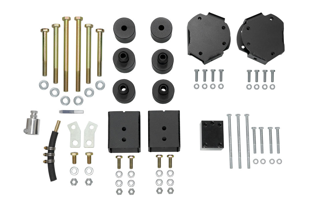 STRIKER 2 Lift Kit (Front Only) for Sprinter 2WD (2007-2018) by VAN COMPASS includes black metal parts, bolts, and components for enhancing vehicle clearance.