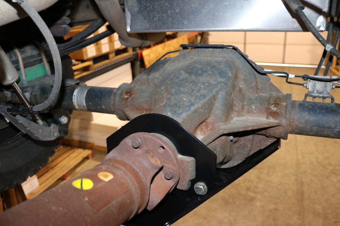 Differential Skid Plate for Transit (2015-2022) by Van Compass, made of 1/4 steel, protects the rear differential and driveshaft u-joints from obstacles.