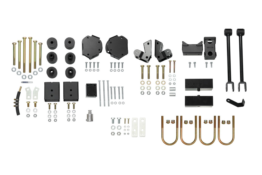 STRIKER 2 LIFT KIT (COMPLETE) - SPRINTER 2WD (2007-2018) by VAN COMPASS, featuring various black metal components, including bolts, nuts, and lift blocks for enhanced vehicle clearance and ride quality.